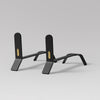 A pair of Eldvarm Cooper Fire Dogs by ELDVARM, in a modern and minimalist design, displayed on a grey background.
