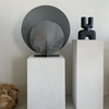 Three COBRA DOUBLE SCULPTURES on pedestals in front of a white wall, by 101 COPENHAGEN, at Gestalt Haus.