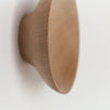 An ADÃO COAT PEG by ORIGIN MADE hanging on a Gestalt Haus wall.