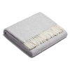 A SIBAST ALPACA HERRINGBONE THROW from Gestalt Haus with fringes.