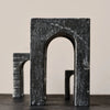 A pair of Gestalt Haus sculptures by GEJST on a table.