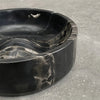 A Gestalt Haus CIRQUE BOWL on a concrete floor.