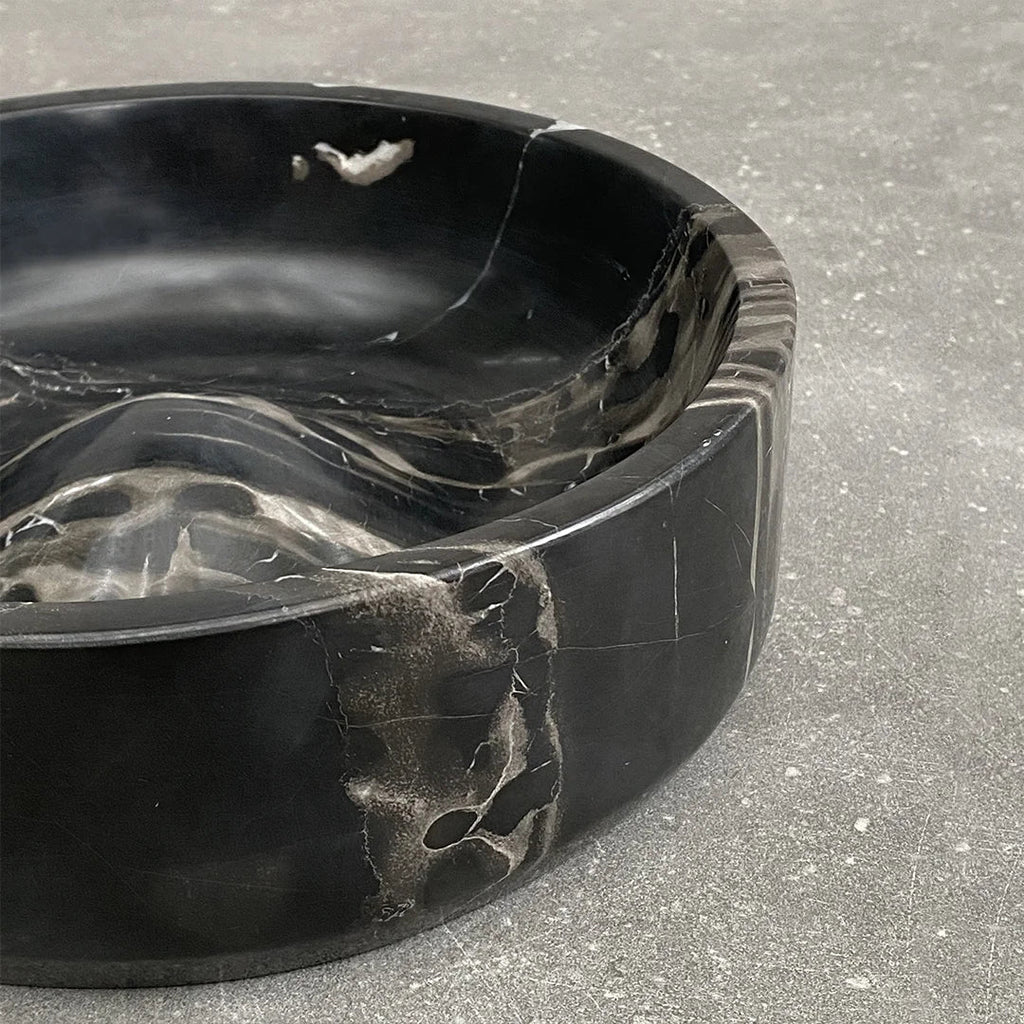 A Gestalt Haus CIRQUE BOWL on a concrete floor.