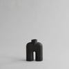 A COBRA TALL SCULPTURE from 101 COPENHAGEN sitting on a white surface at Gestalt Haus.