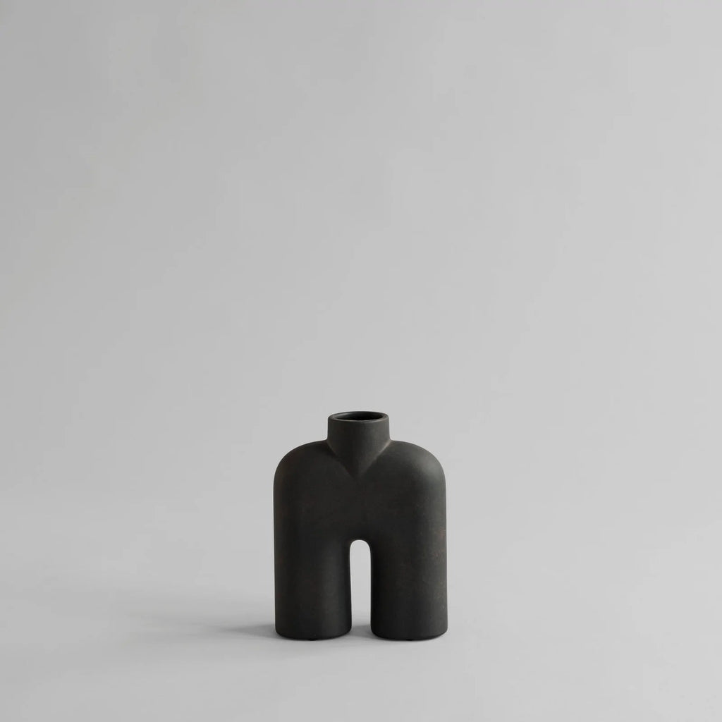 A COBRA TALL SCULPTURE from 101 COPENHAGEN sitting on a white surface at Gestalt Haus.