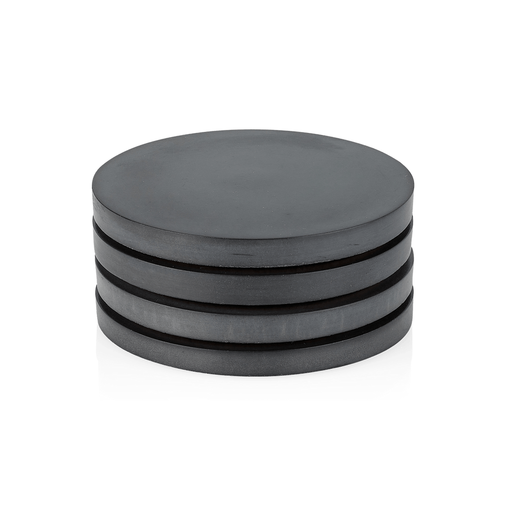A set of Gestalt Haus concrete coasters on a white background.