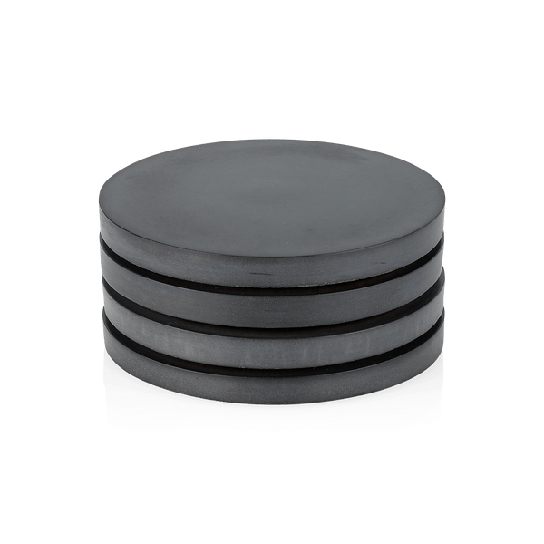 A set of Gestalt Haus concrete coasters on a white background.