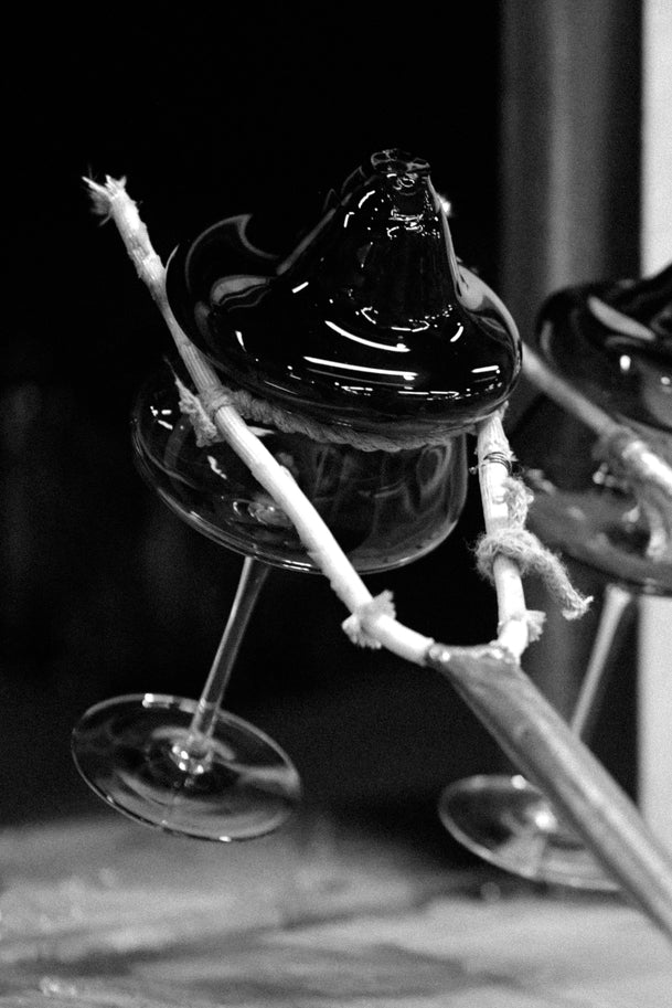 Two LOUISE ROE CRYSTAL CHAMPAGNE COUPE glasses on a table at Gestalt Haus.