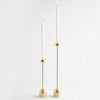 Two Gestalt Haus candle holders on a white background.