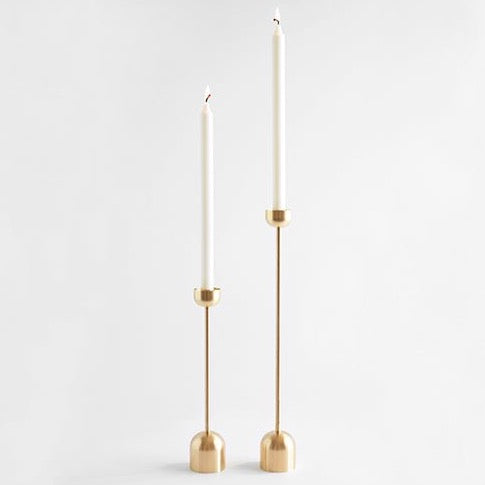 Two Gestalt Haus candle holders on a white background.