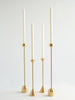 Three Gestalt Haus DOME SPINDLE CANDLE HOLDERS by FS OBJECTS on a white surface.