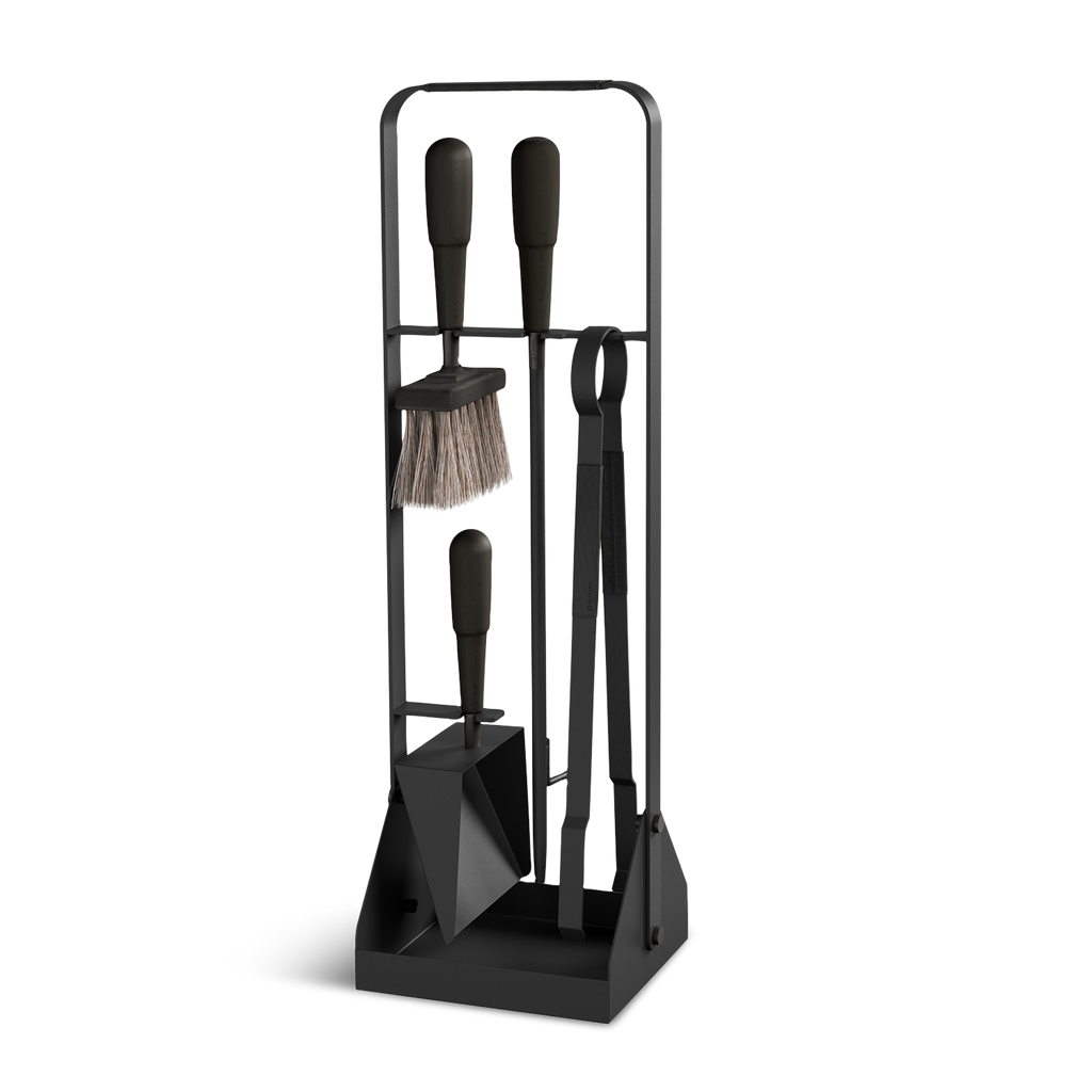 An ELDVARM EMMA FIRE TOOL COMPANION SET stand with a set of tools and a broom.