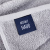 A face washer labeled Gestalt Haus.