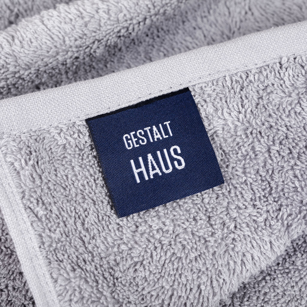 A face washer labeled Gestalt Haus.