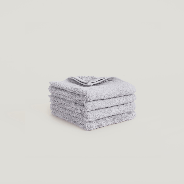 A stack of GESTALT HAUS towels on a white background.