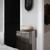 A black and white bedroom with a Gallery Object Bowl bedside table by Louise Roe.