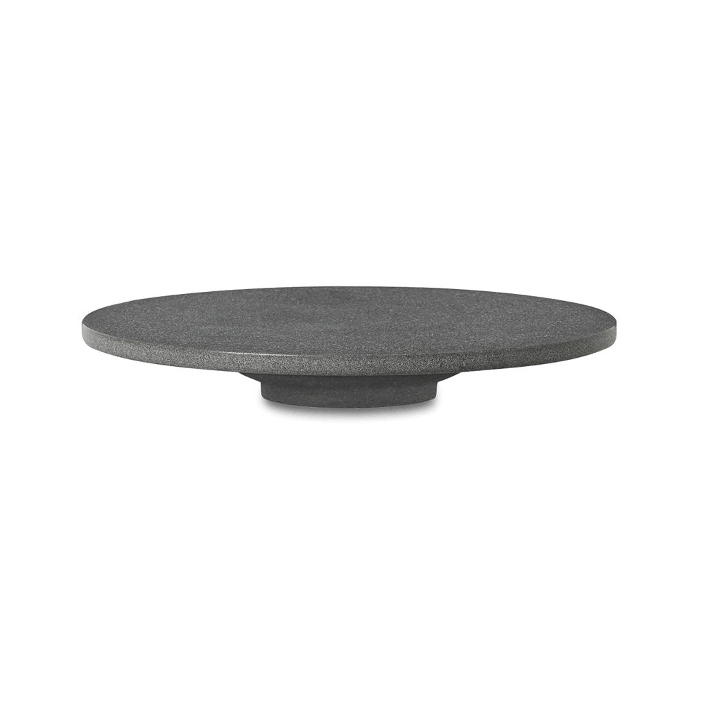 A round black plate on a white background, Louise Roe - Gestalt Haus.