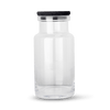 A Louise Roe glass container with a black lid, available at Gestalt Haus.