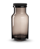A Louise Roe glass jar with a black lid on a white background, showcasing Gestalt Haus design.