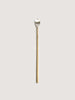 An IHADA MUDDLER SPOON with a gold handle on a white background, designed by FUTAGAMI, embodies the essence of Gestalt Haus.