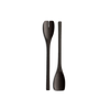 Two JOHN PAWSON SALAD SERVERS by WHEN OBJECTS WORK on a black background, showcasing the elegant design of Gestalt Haus.
