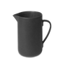 A PISU pitcher by LOUISE ROE on a black background with Gestalt Haus influence.