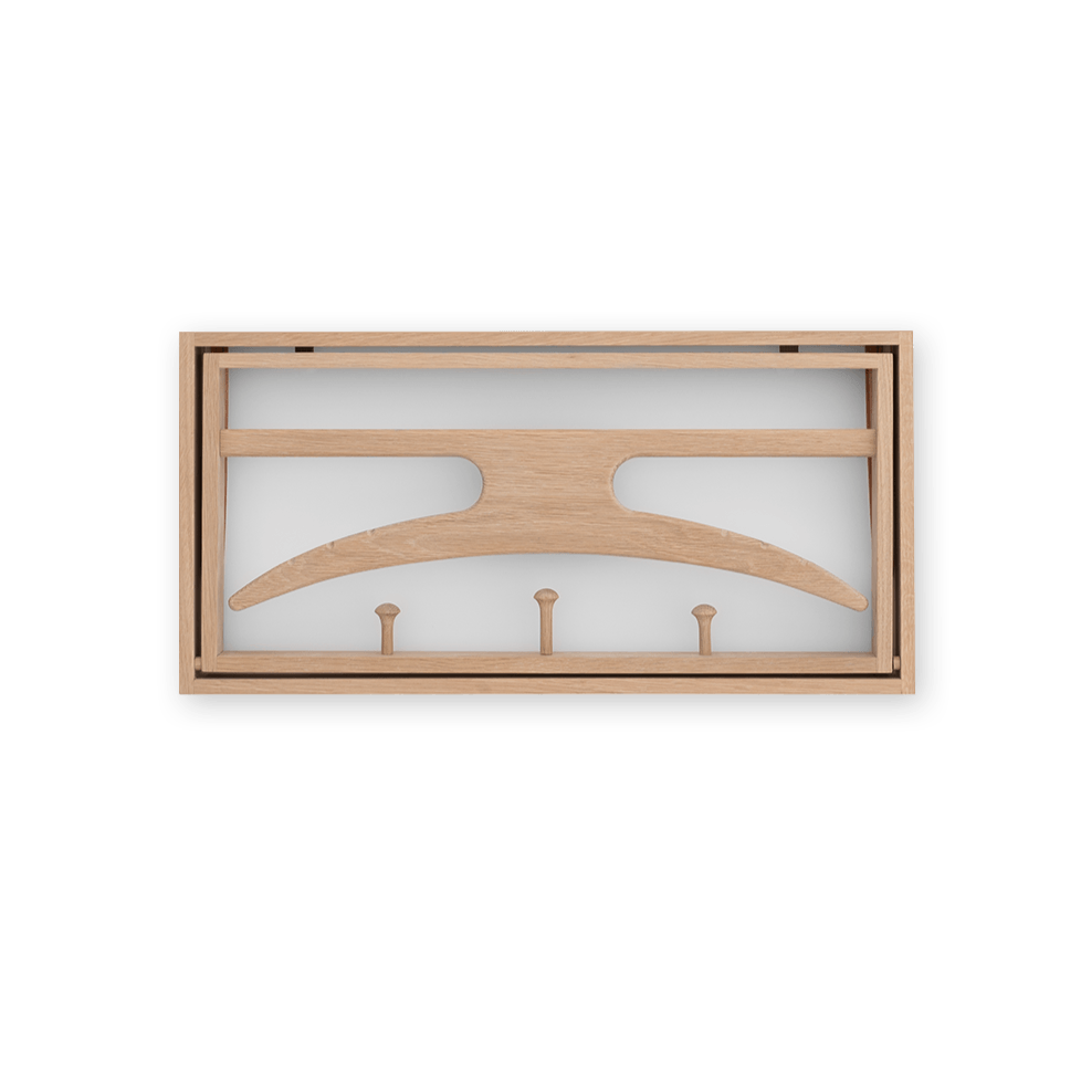 A KLASSIK STUDIO wooden hanger with two hooks on it.