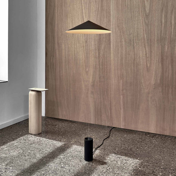 An ANONY wooden floor lamp and table in a Gestalt Haus room.
